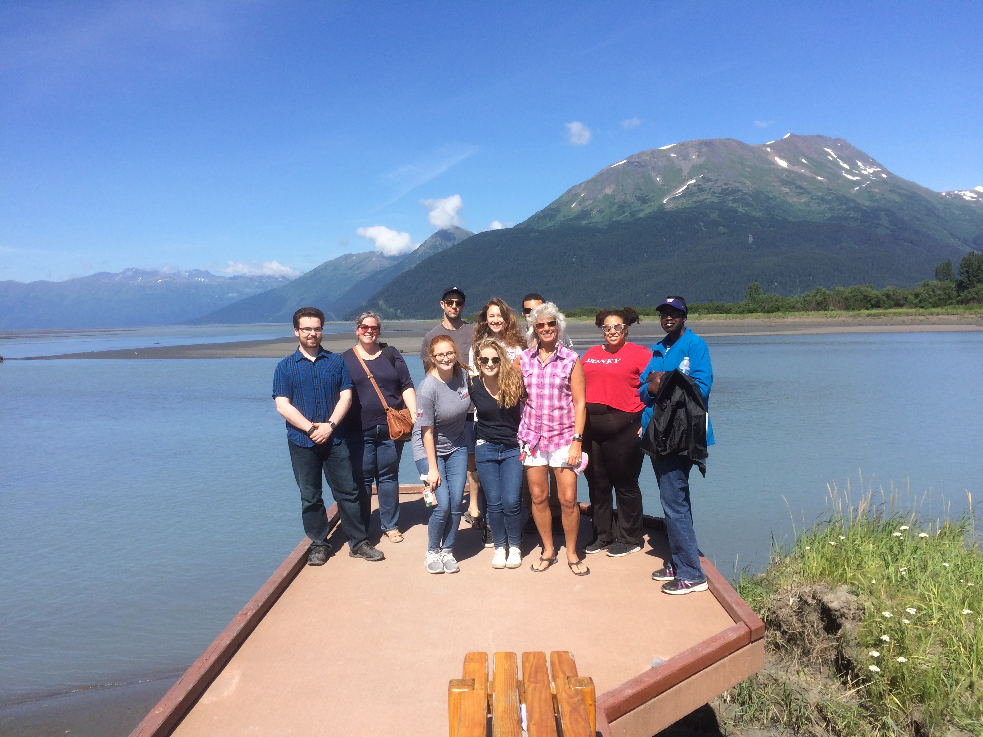 Riin students in front of a lake