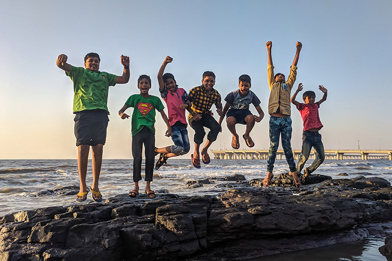 A group of boys jumping