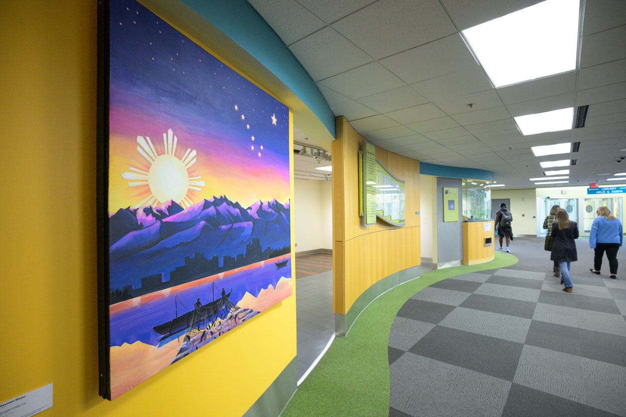 Painting hanging outside Alumni Center