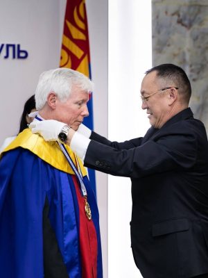Professor John Duffy of UAA and President Tumurbaatar Yadmaa of NUM
