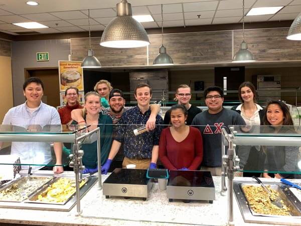 Student leaders pose after serving Thanksgiving feast