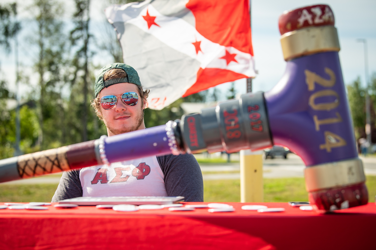Alpha Sigma Phi UAA chapter president Aeron Mills at the fraternity’s booth during Campus Kickoff on August 21, 2021