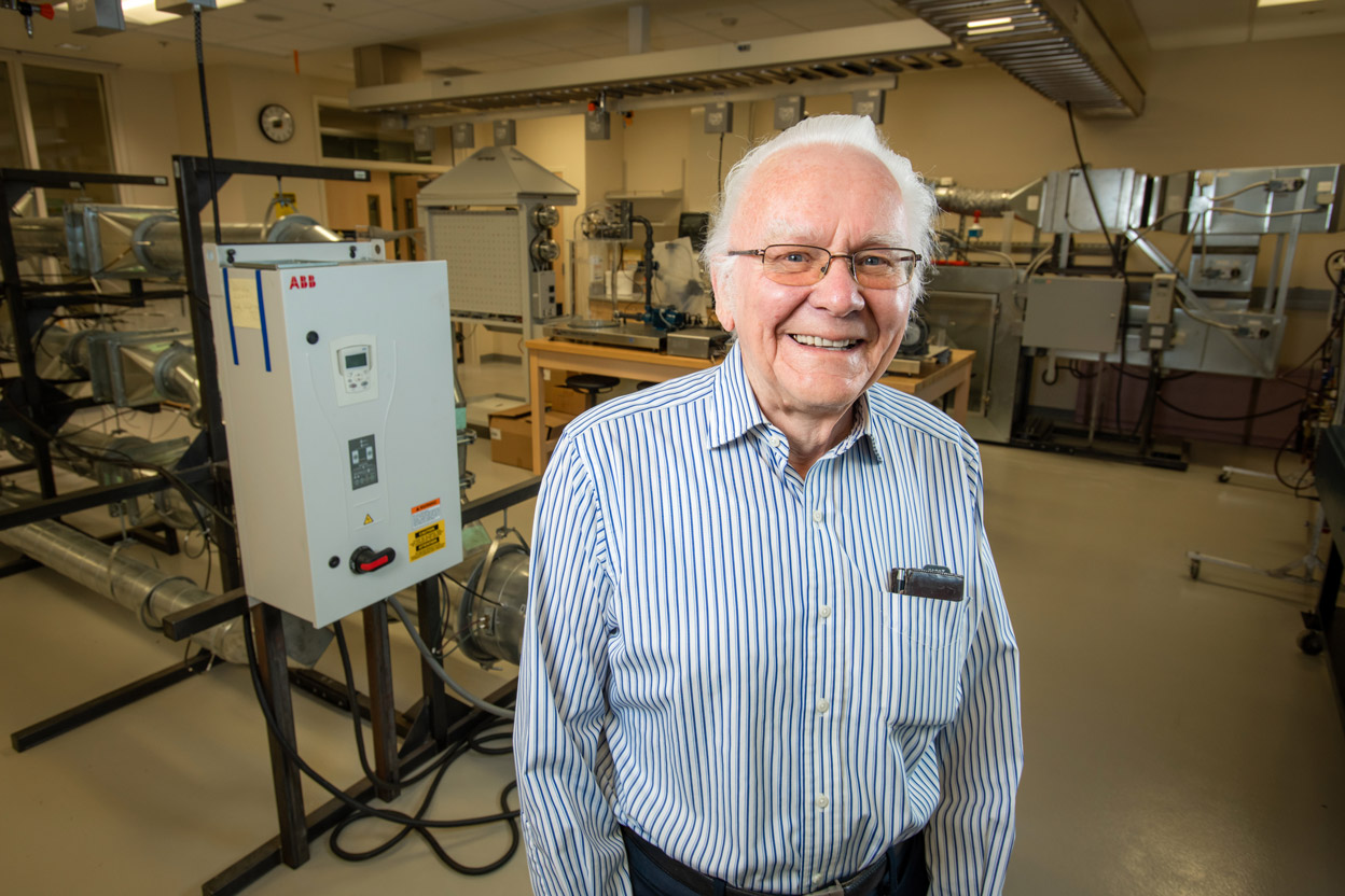 Engineering alumnus and UAA donor Jan van den Top in the Heating, Ventilation and Air Conditioning Lab that now bears his name. (Photo by James Evans / University of Alaska Anchorage)