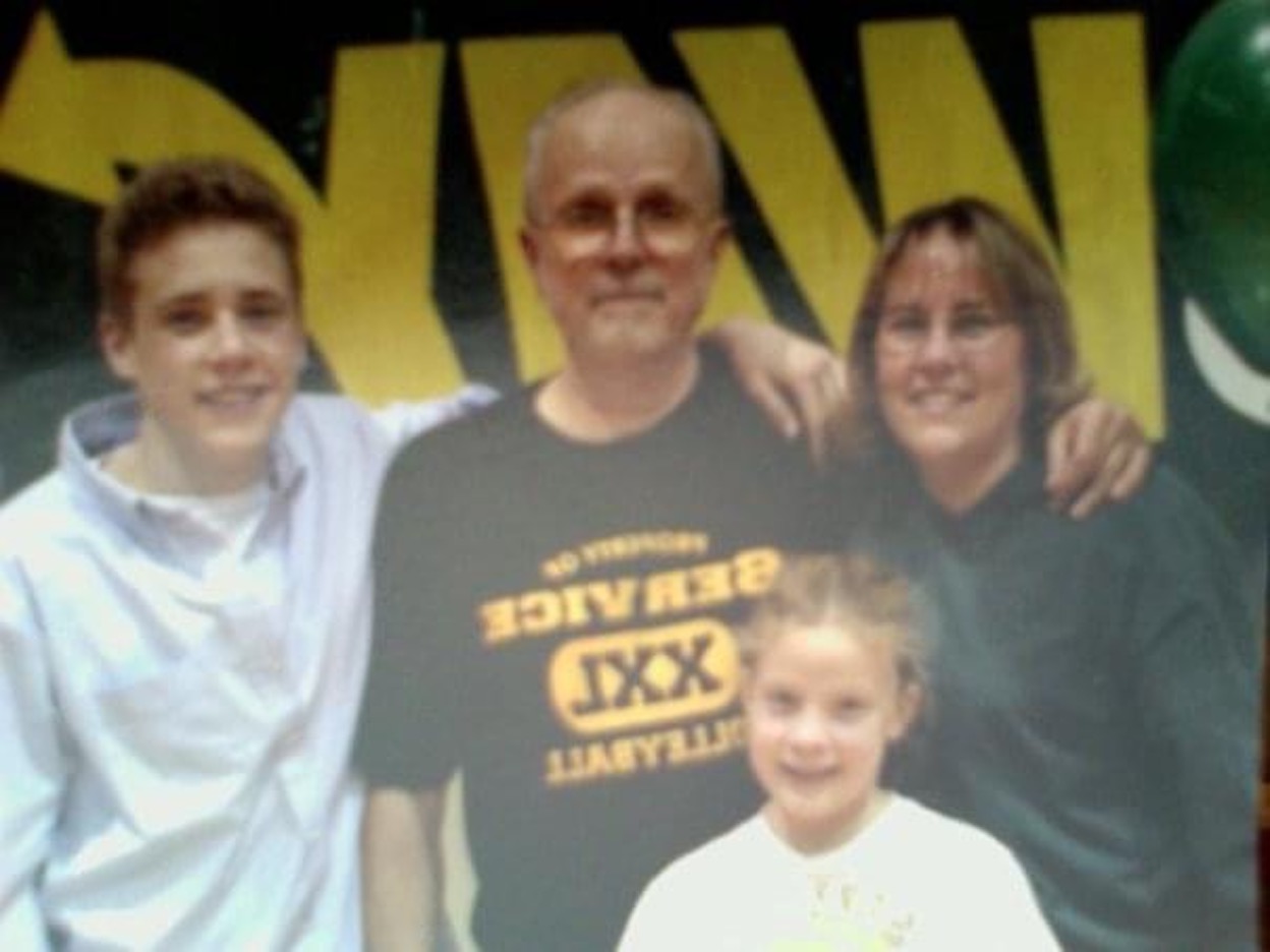 oung Hooe (center right) pictured with her brother (left), father (center left) and mother (right)
