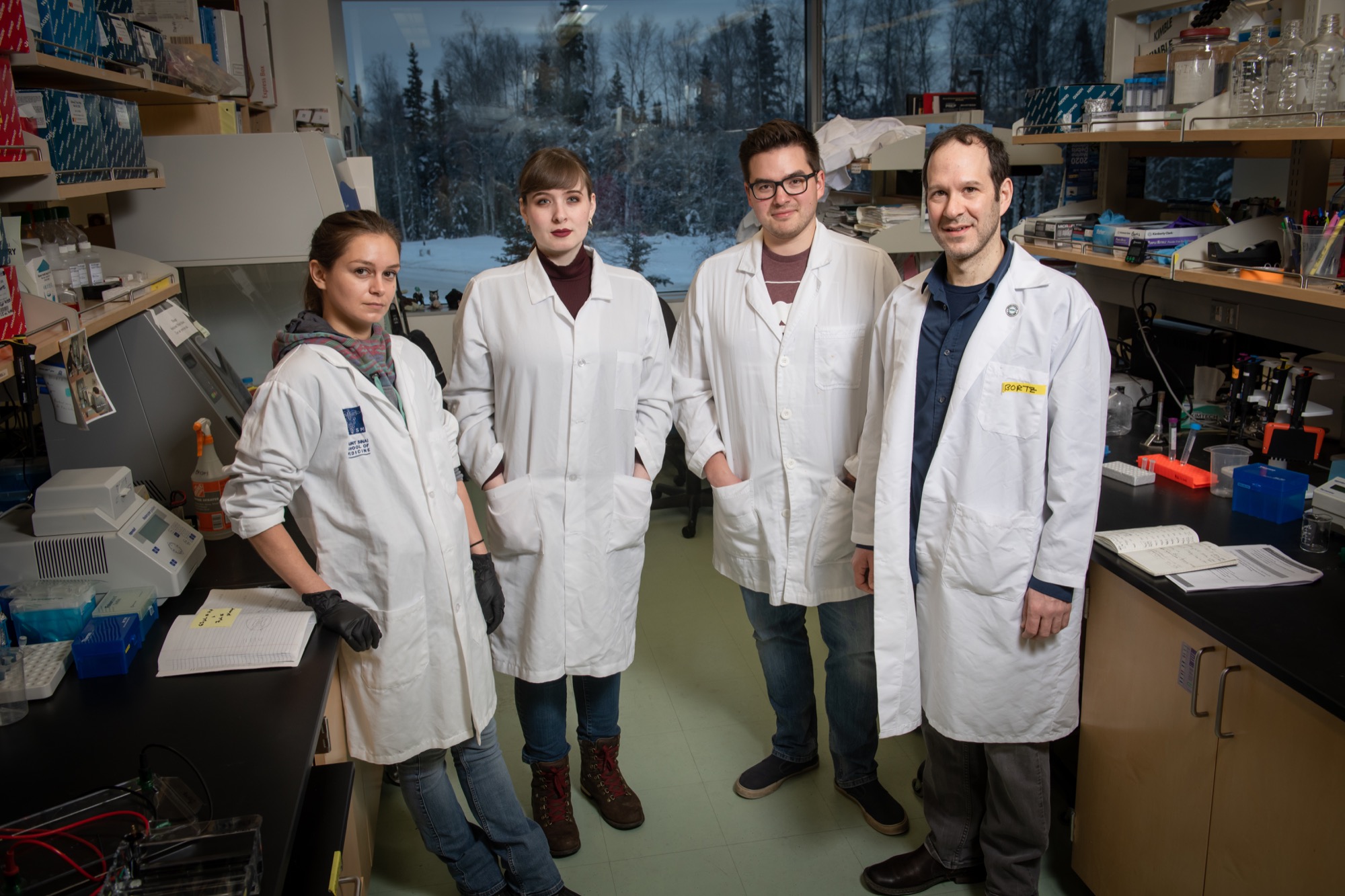 The four researchers comprising the Bortz lab
