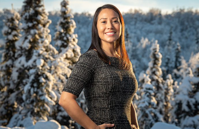 UAA graduate degree hooding ceremony student speaker Naidene Baechler, M.S.W. Social Work ’20
