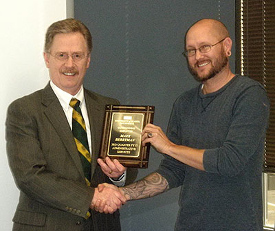 mark receiving an award