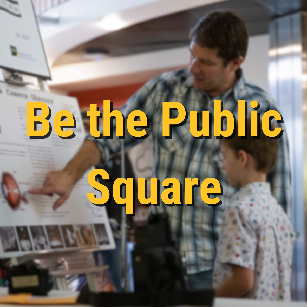 Be the Public Square overlay a professor with a young kid at UAA STEM Day