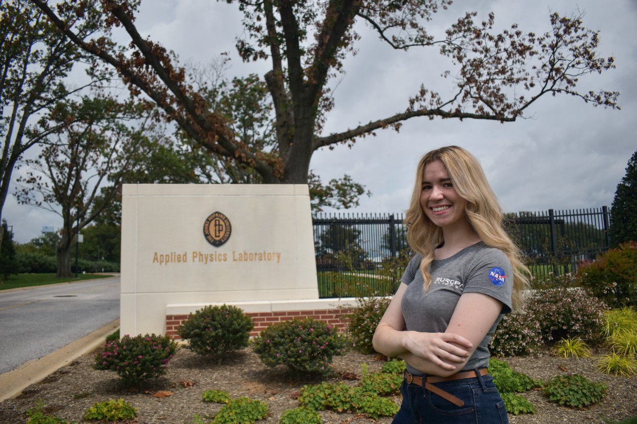 Chalie Detelich confidently standing outside the Applied Physics Laboratory
