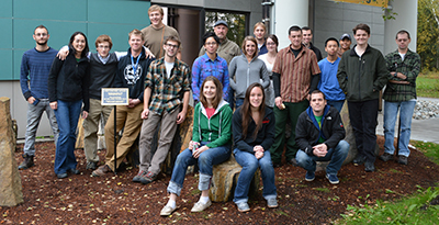 Members of the Geology Club posing in the UAA Rock Garden