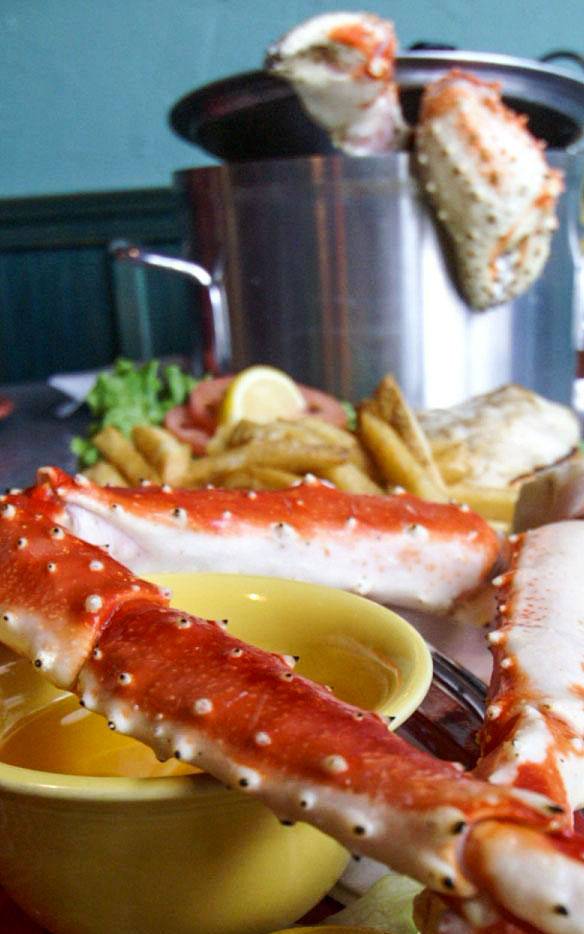 Delicious plate of crab legs with butter