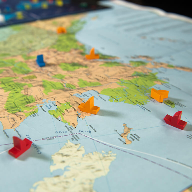 map of Alaska with game pieces