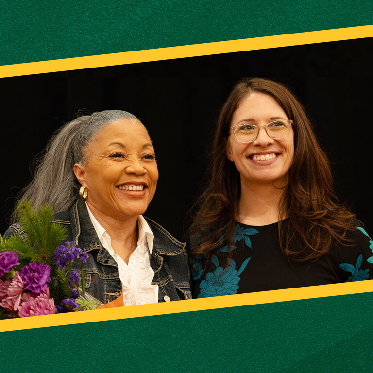 Dr. Terry Nelson receiving a 2023 YWCA Women of Achievement award.