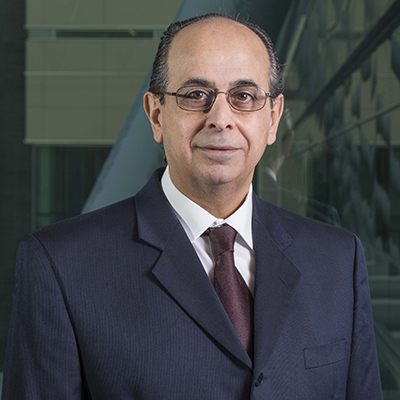 Portrait of professor Osama Abaza in a suit.