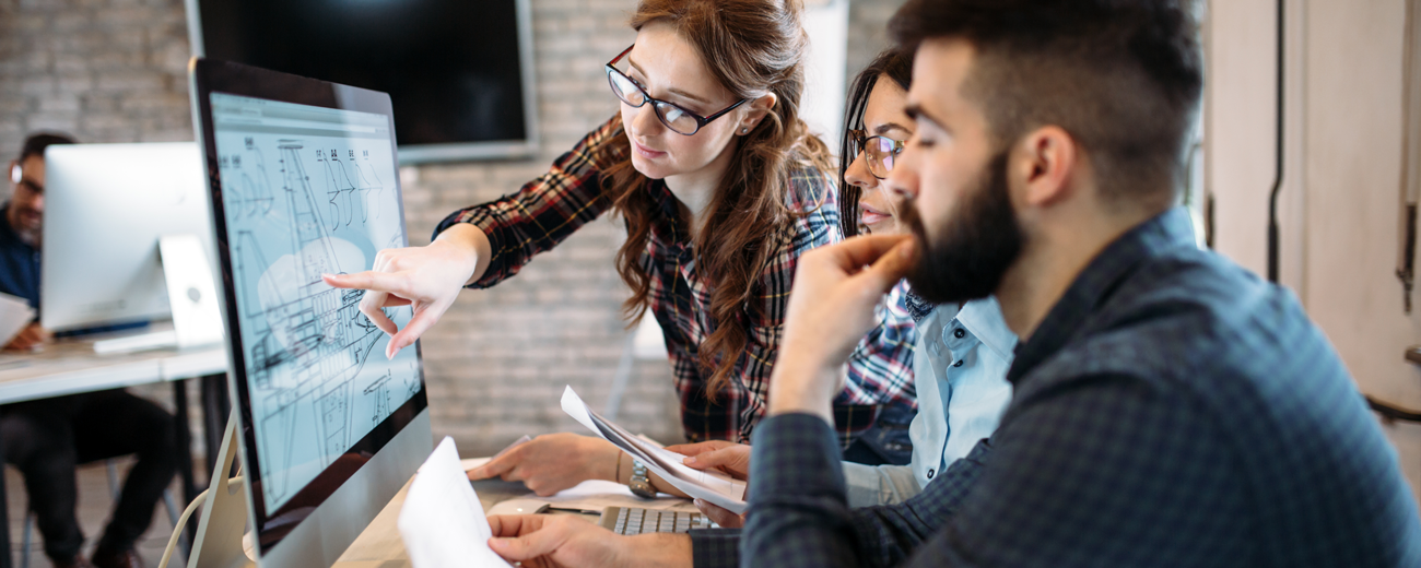 Interns collaborate on a project