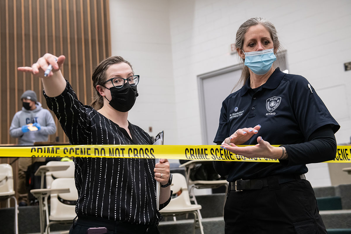 Criminal Investigation students observe a mock crime scene