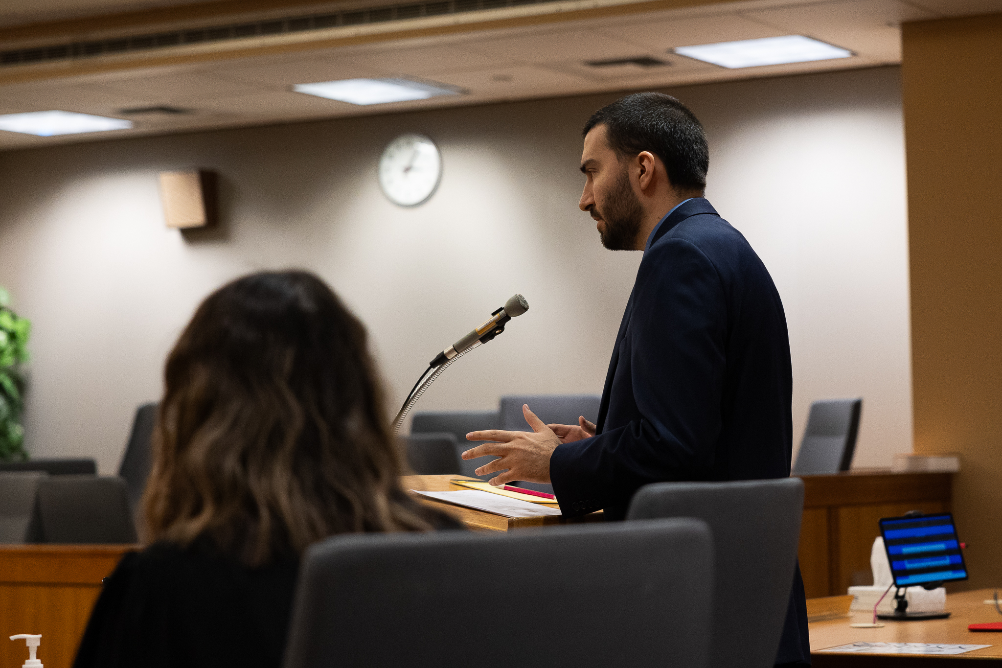 Legal studies confer over notes during a mock trial