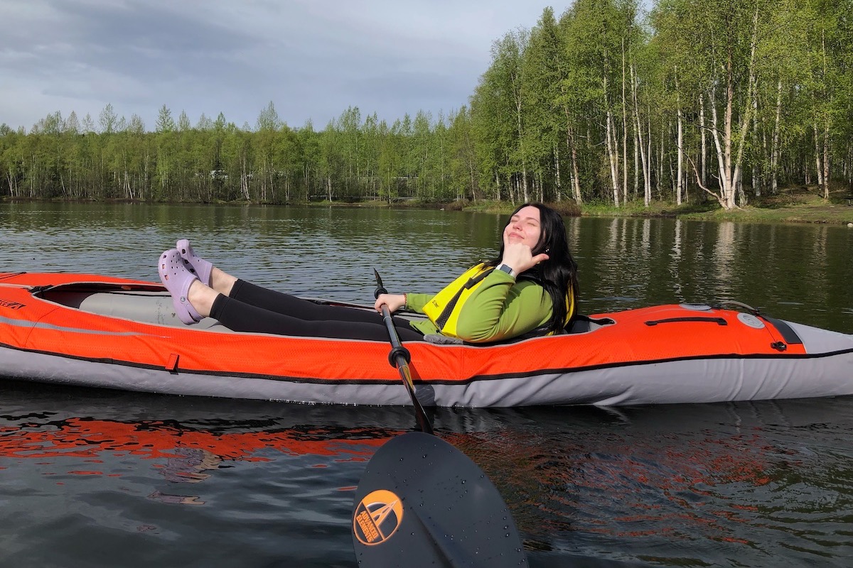 Kendyl Laughlin relaxing in kayak on water