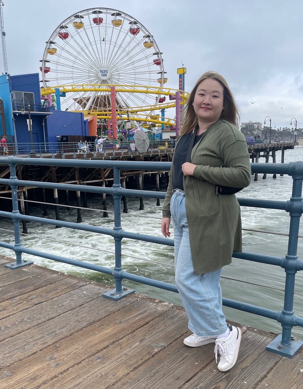 Jenny Kwon standing by pier
