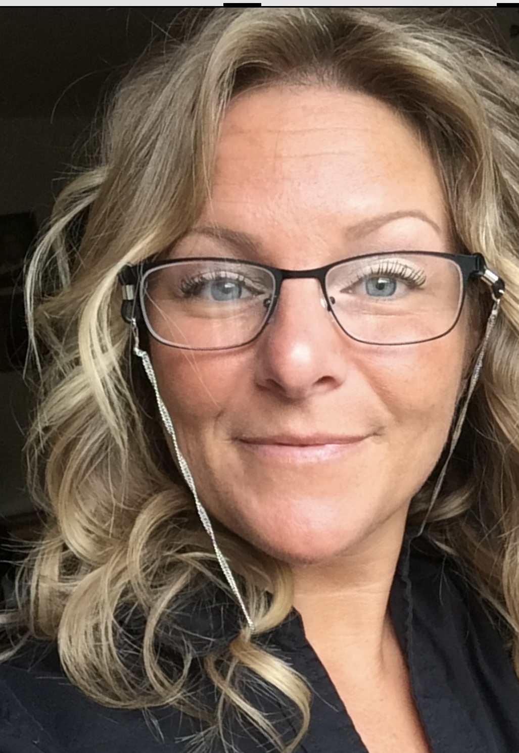 Grace Leu Burke in her lab coat at the HSB laboratory