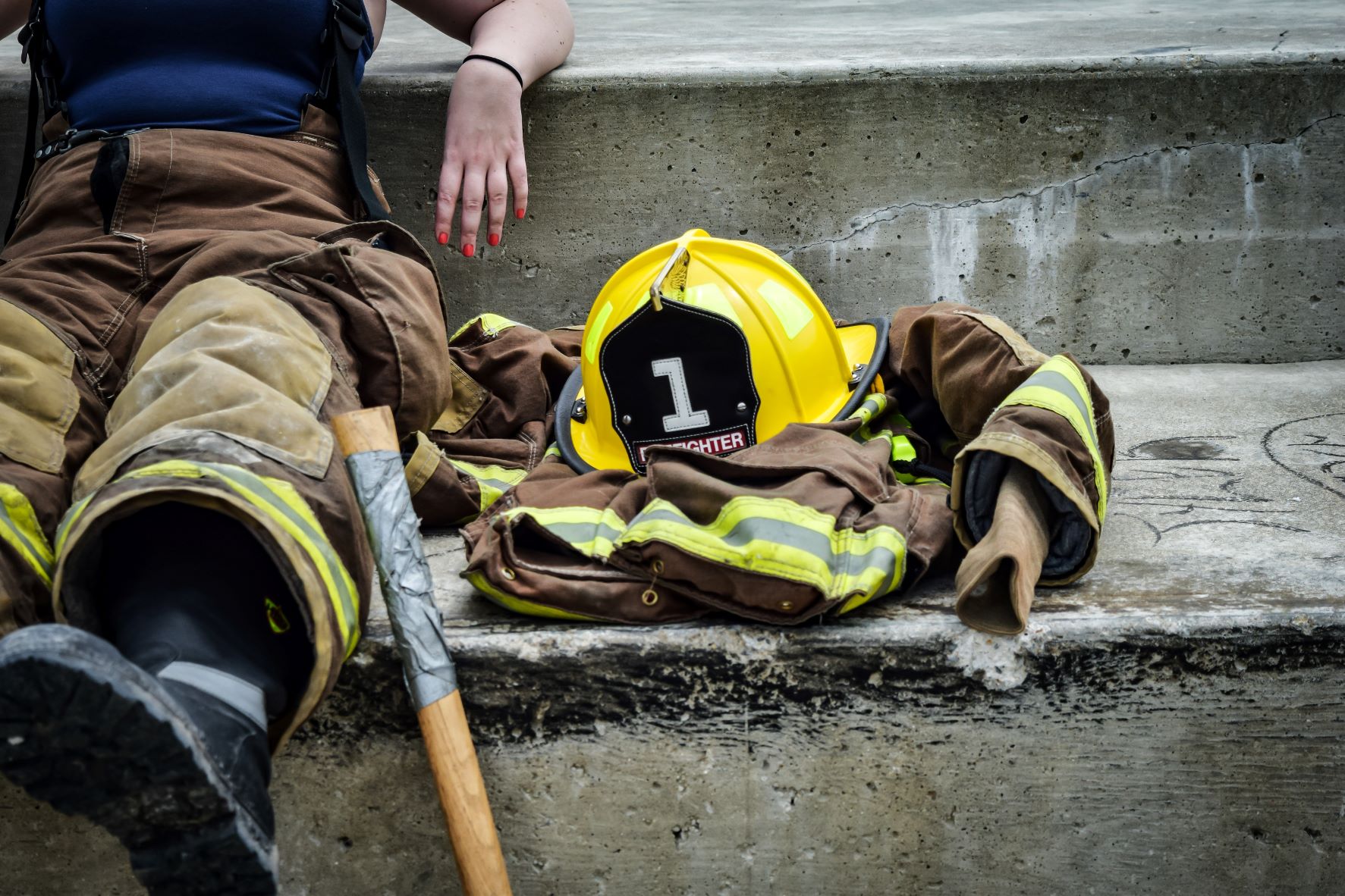 Firefighter sitting on stairs
