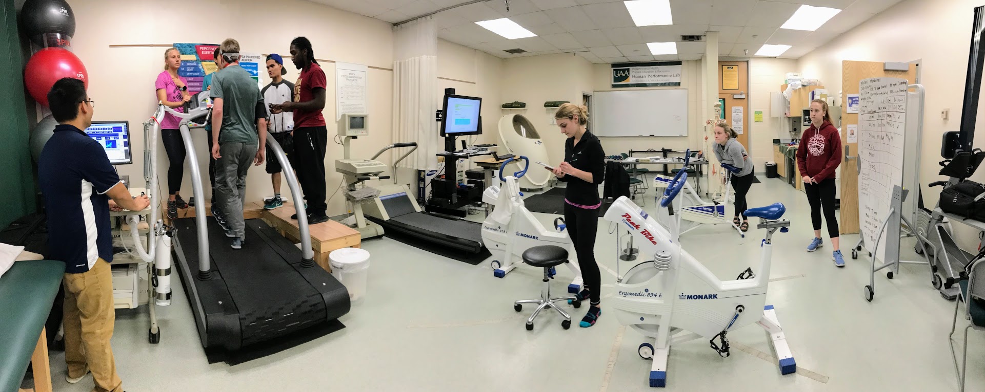 Students in the human performance lab practice administering tests