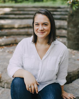 anna flores smiling on outdoor straircase