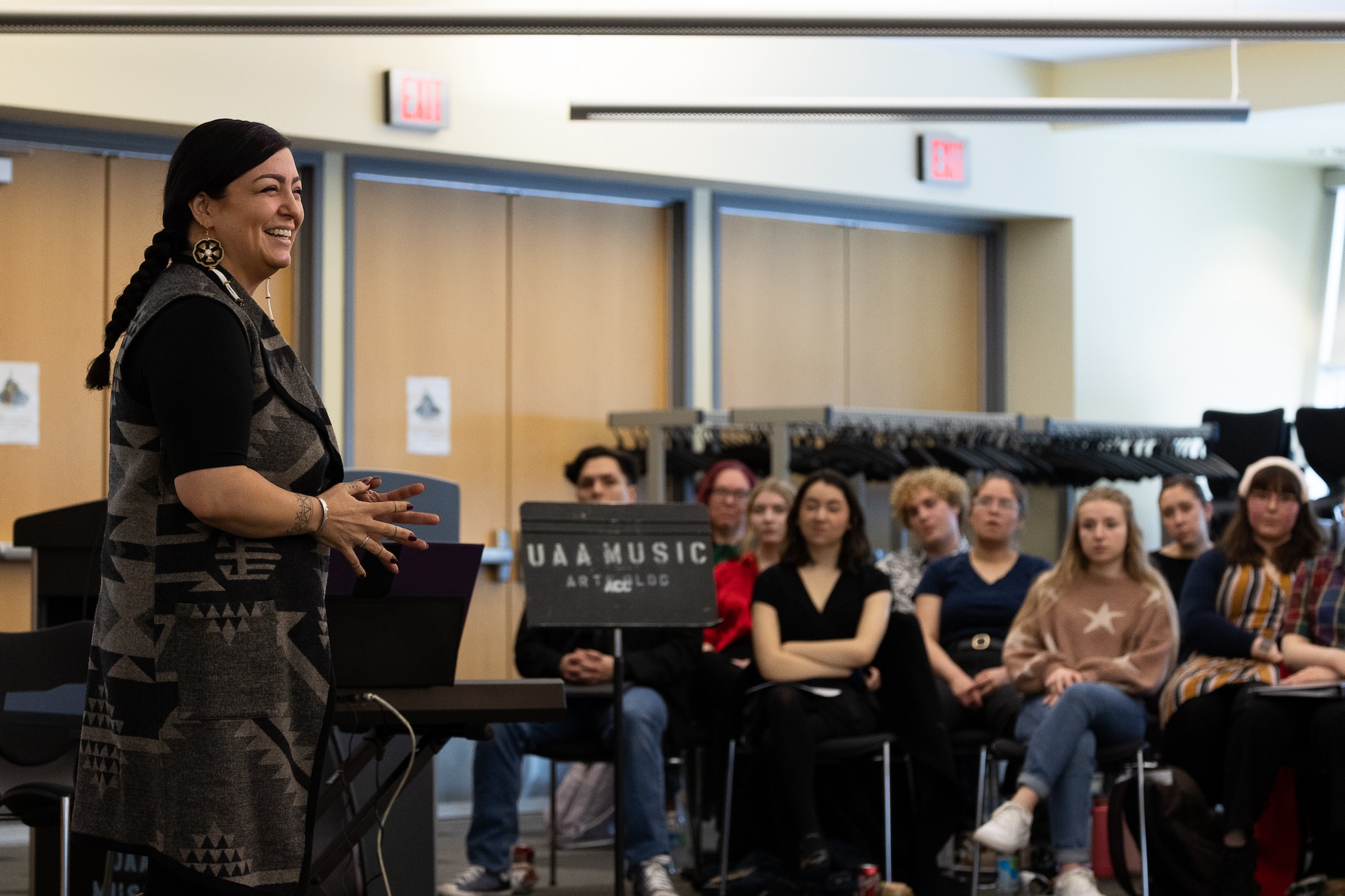 Jessica ross speaking to room of people