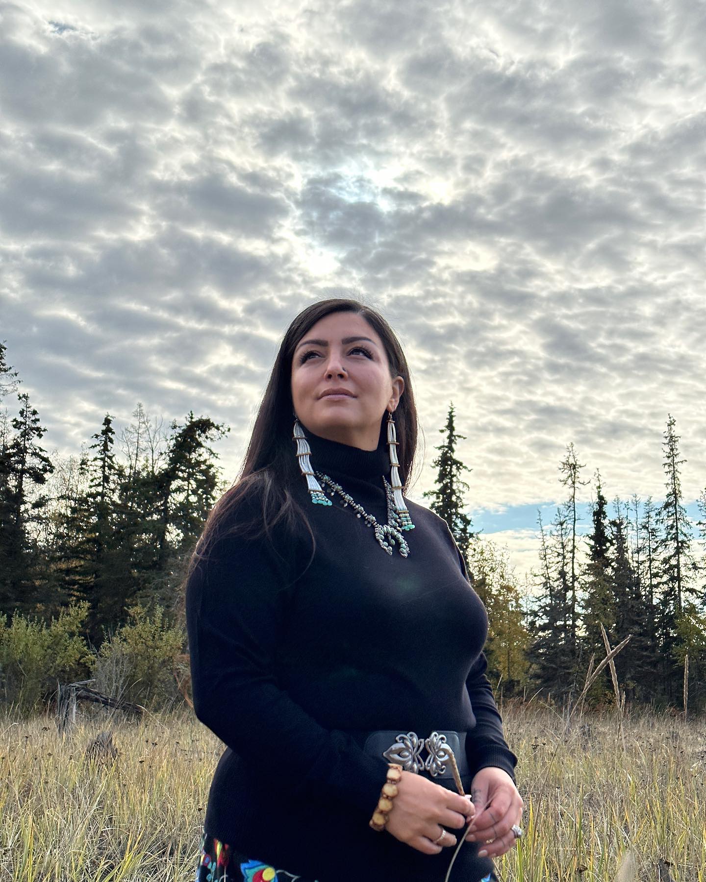 jessica ross standing outdoors and looking at sky