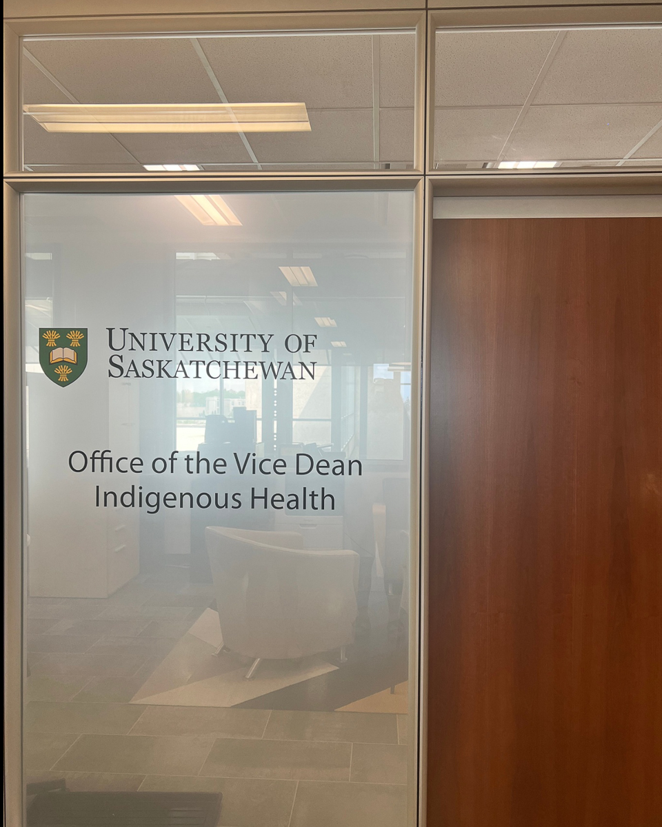 glass office door reading "office of the vice dean indiginous health"