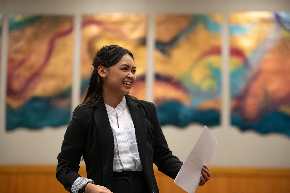 A student presents her oral arguments