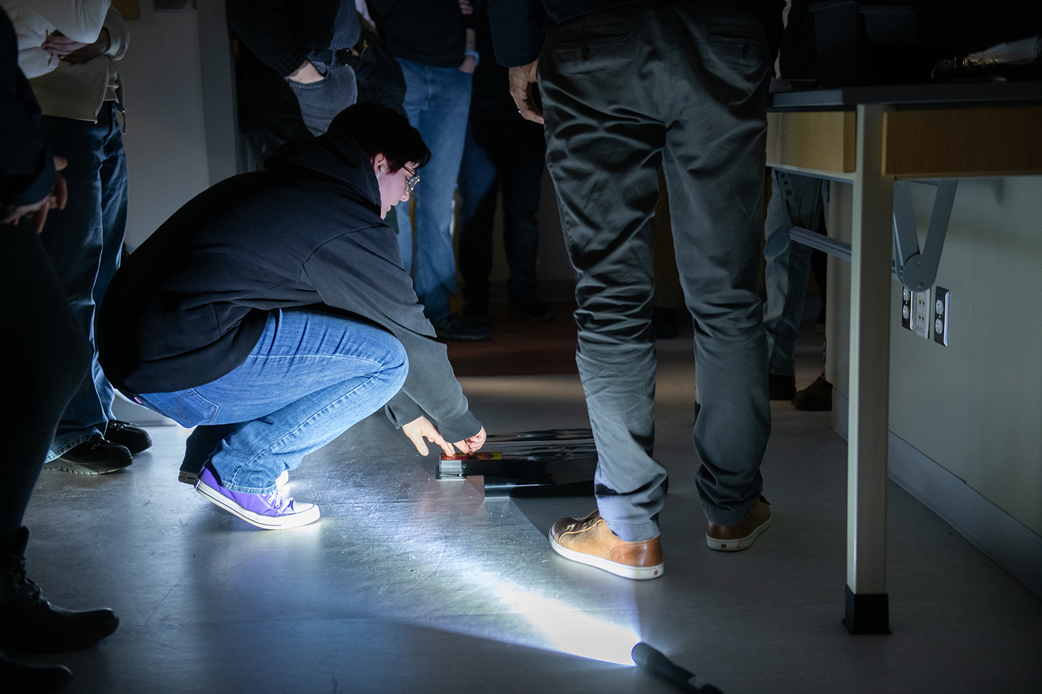 Students examine footprint