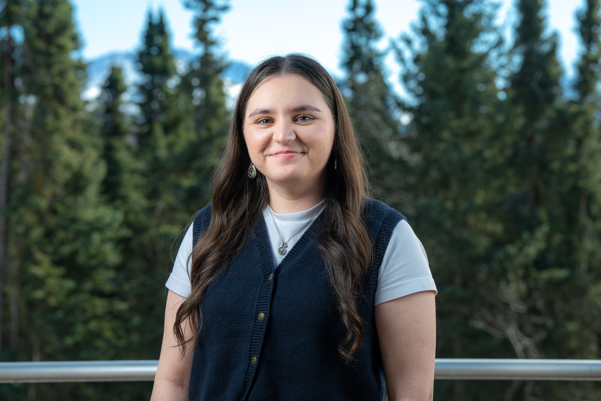 Albiona Selimi spring 2025 commencement speaker smiling with scenic bakground