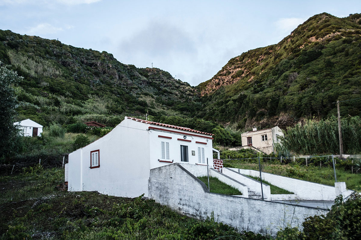 A house sitting on a hillside