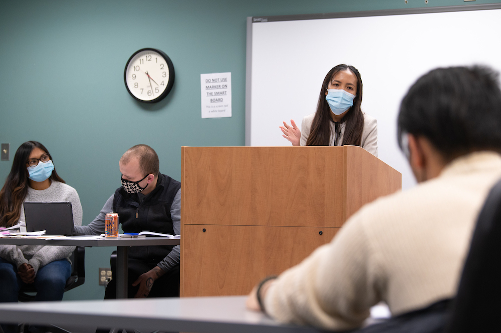 Counsel for the plaintiff Phuong Green questions a witness as students in UAA Justice Center associate professor Ryan Fortson's trial and advanced litigation processes (LEGAL A487) course conduct a mock trial in the Professional Studies Building.