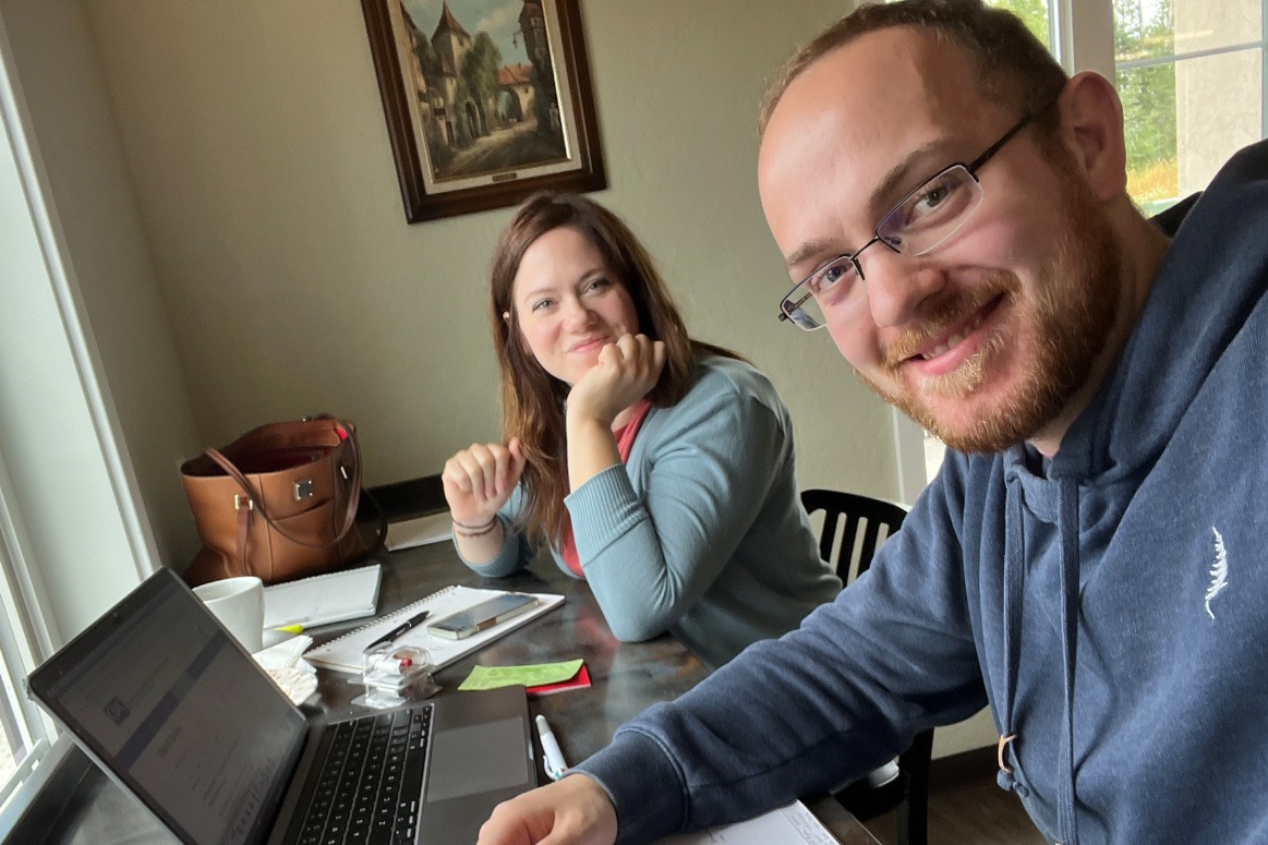 A light-hearted moment during the brainstorming around a kitchen table: Ian Richey and Battalion Chief Nancy Lockett came up with strategies to address the opioid threat in rural Alaska.