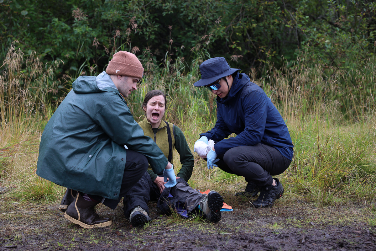 medical students treating an injurred person
