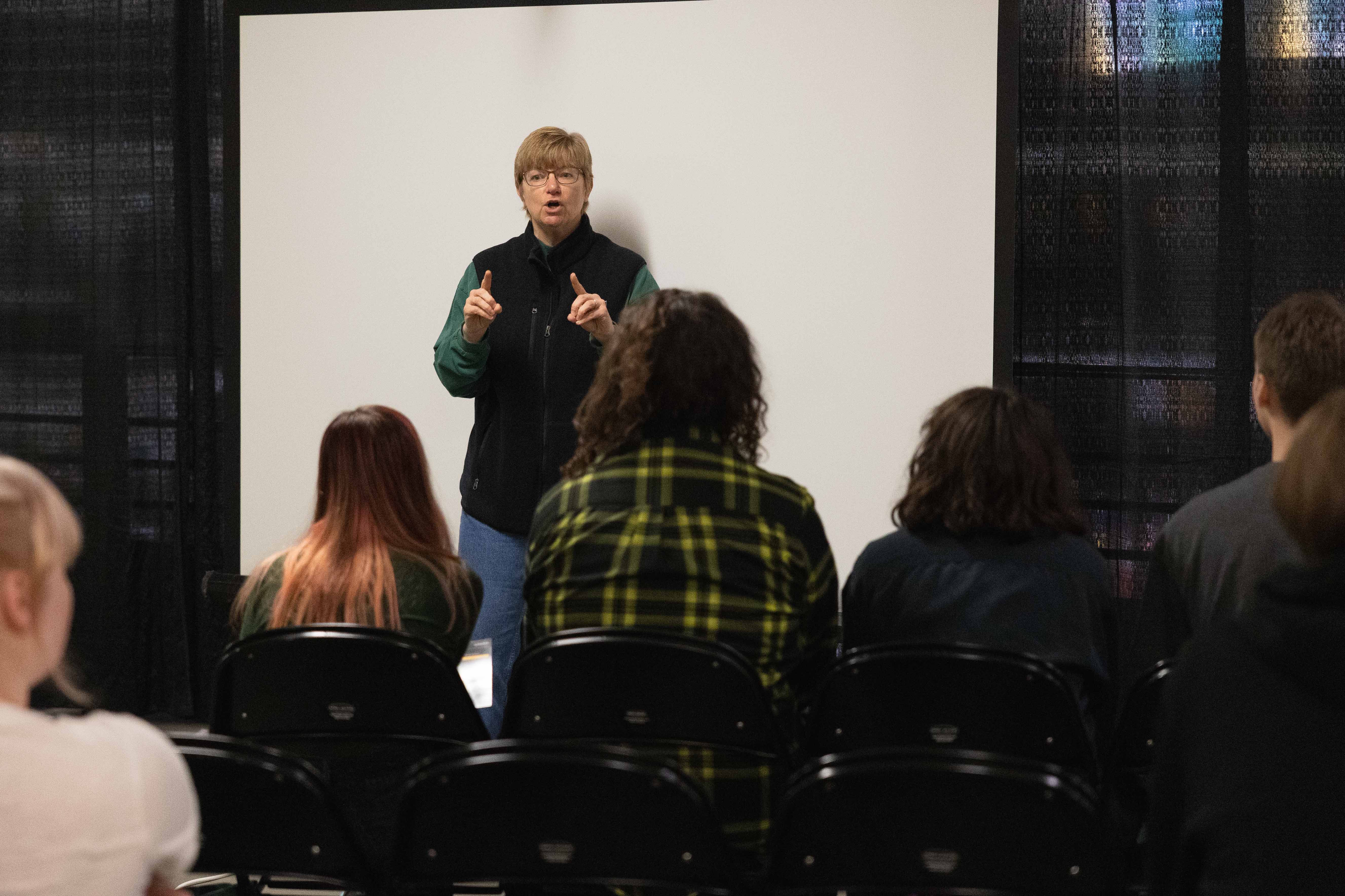 Tracy Burke presents to students