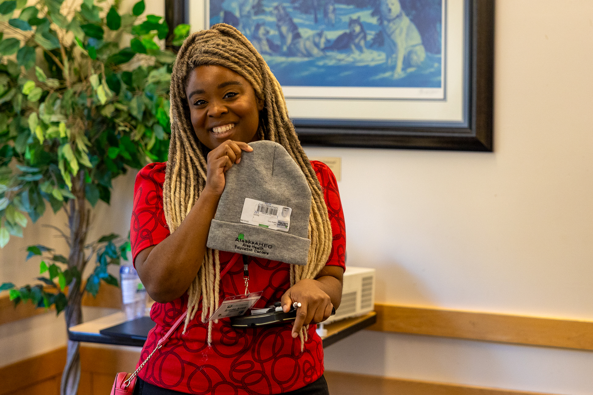 Student holding up a prize she won