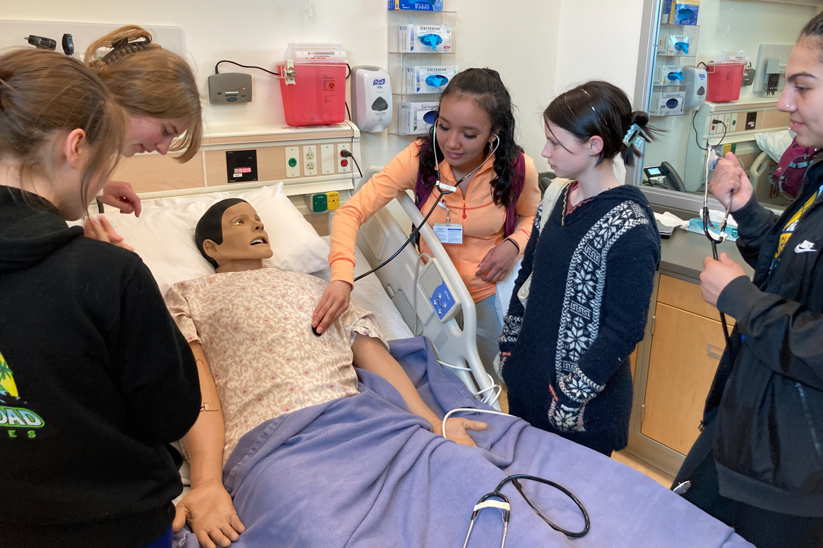 Students participating in an education training at UAA’s Interprofessional Health Sciences Simulation Center during summer 2023.