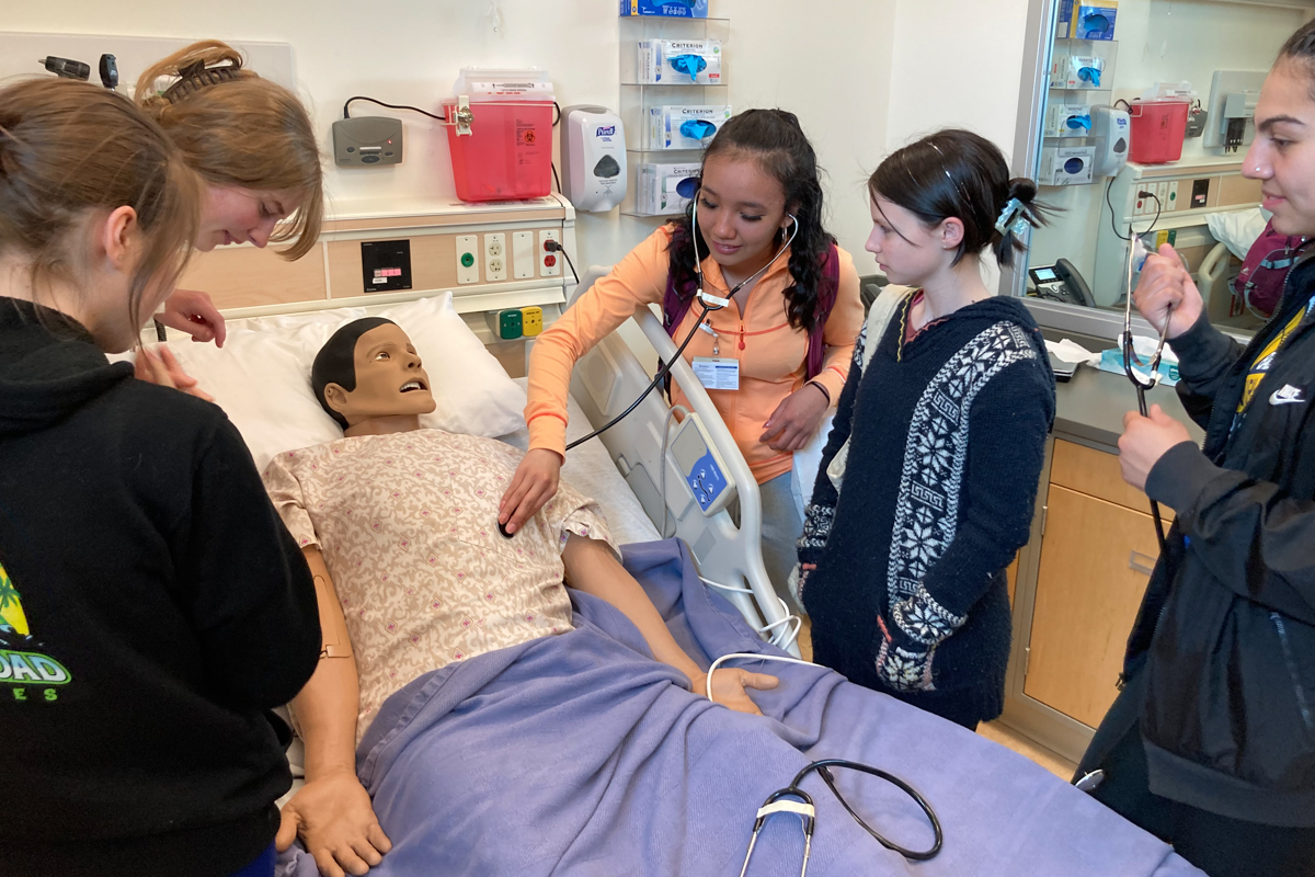 Students participating in an education training at UAA’s Interprofessional Health Sciences Simulation Center during summer 2023. 