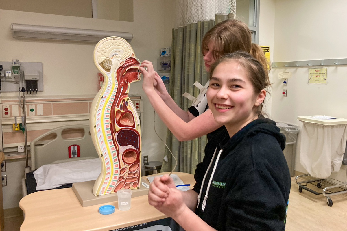 students practicing nursing skills at the UAA nusring skills lab