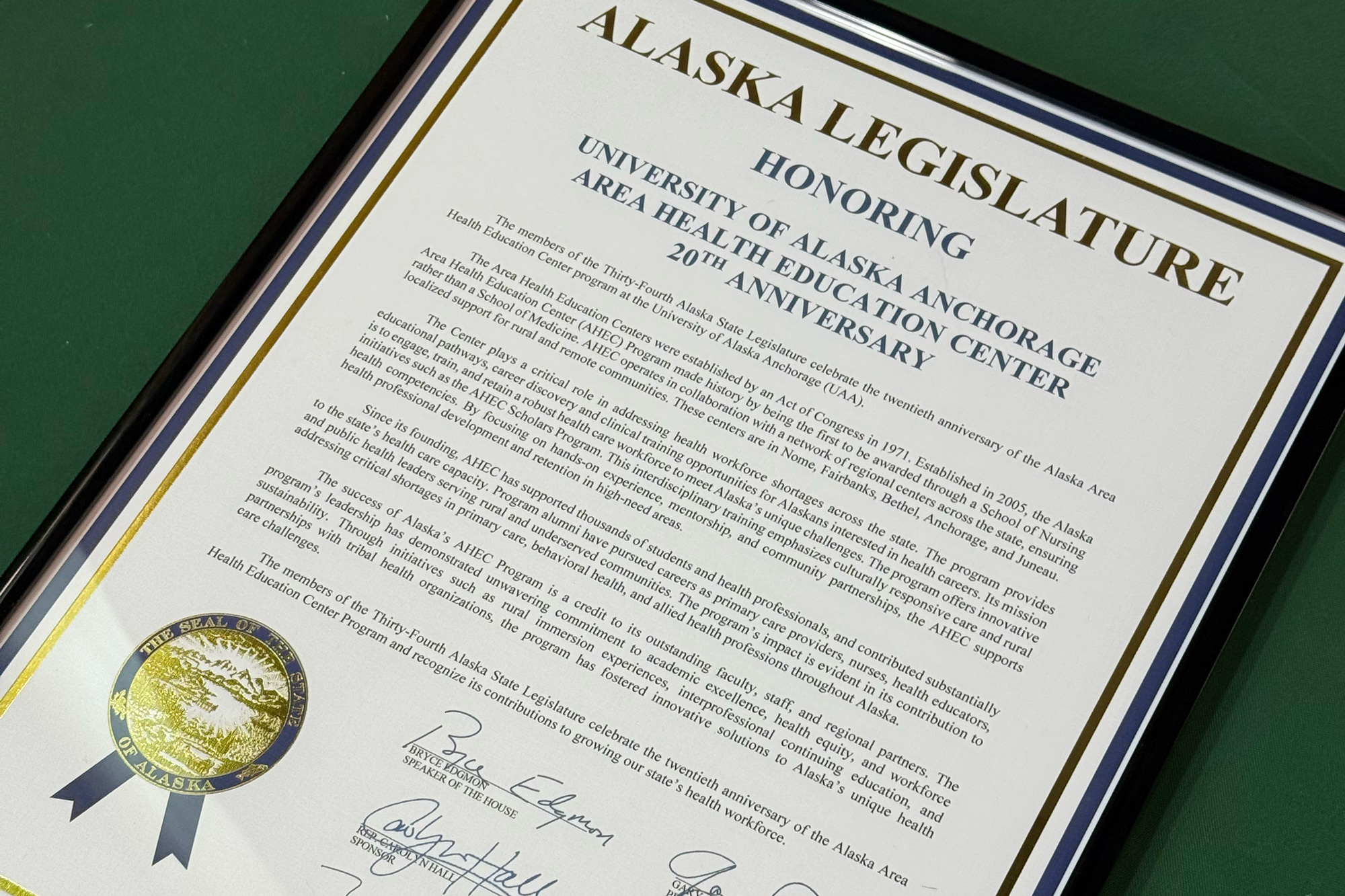 A close look at the Legislative Citation formally presented to the University of Alaska Anchorage Area Health Education Center. The document acknowledges AHEC’s success in engaging students and advancing programs vital to Alaska's rural and urban health communities. (Photo by Kevin Bennett, UAA Alaska Center for Rural Health & Health Workforce)