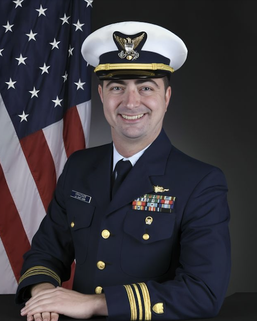 Sam Krakower posing for a portrait in military garb