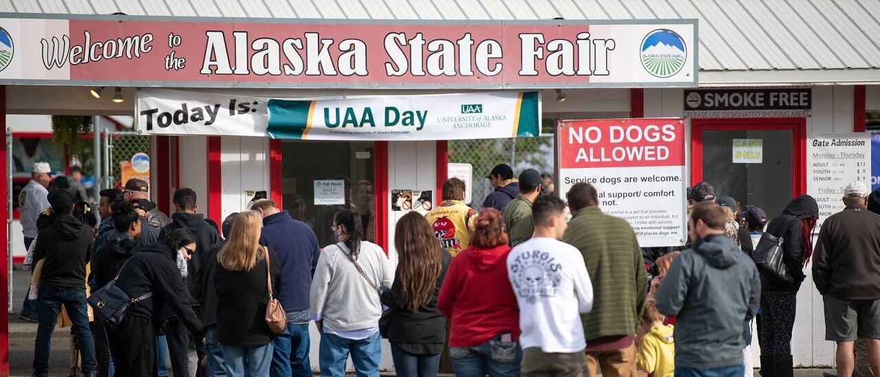 Crowd of people at the Alaska State Fair attending UAA Day.