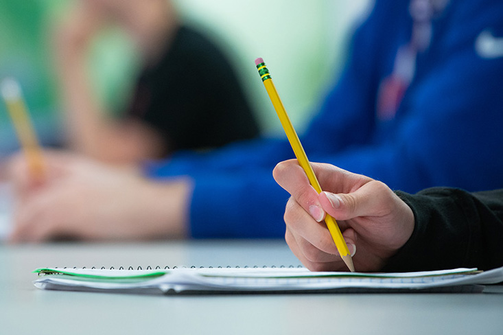 hand writing with a pencil