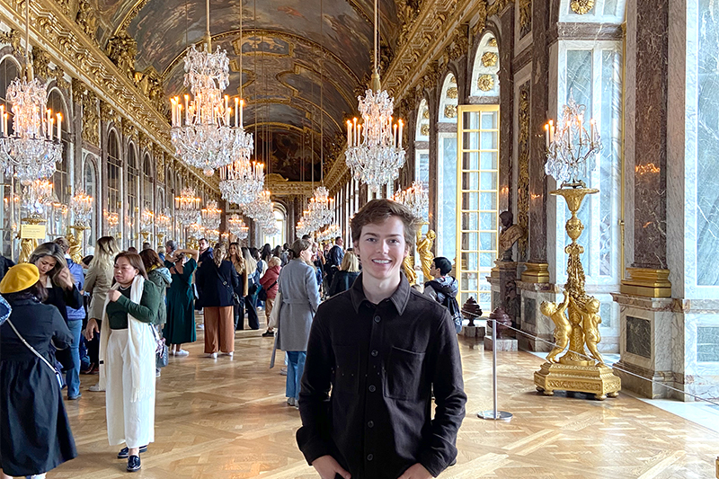 Student in the Hall of Mirrors at Versailles