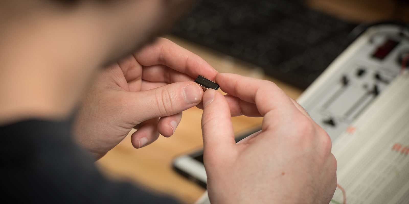 A student working with a microchip