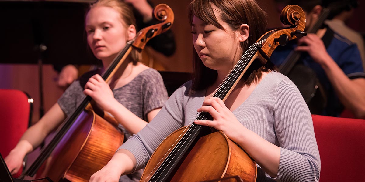 Two students play cellos