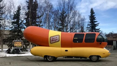 The Wienermobile parked in front of UAA